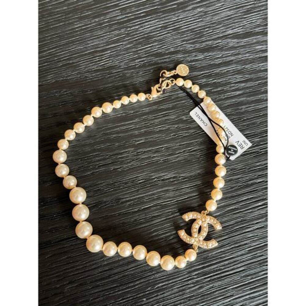 Chanel Authentic Faux Pearl Necklace with CC front emblem NWT